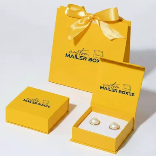 Luxury yellow mailer boxes jewelry packaging with a magnetic rigid box and a matching ribbon gift bag.