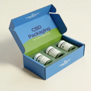 Open bright blue and green custom CBD mailer boxes by 'The Human & Energy Company,' showcasing three white CBD containers held in a green foam insert.